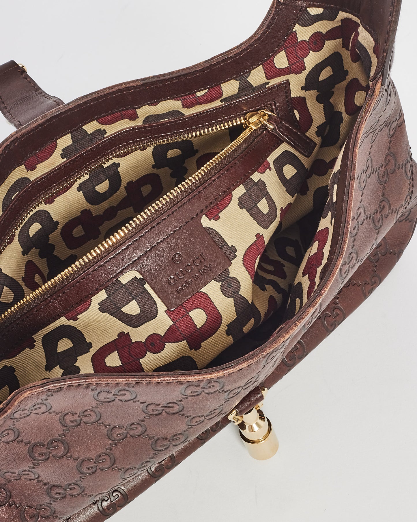 Sac à bandoulière Guccissima Jackie en cuir marron Gucci