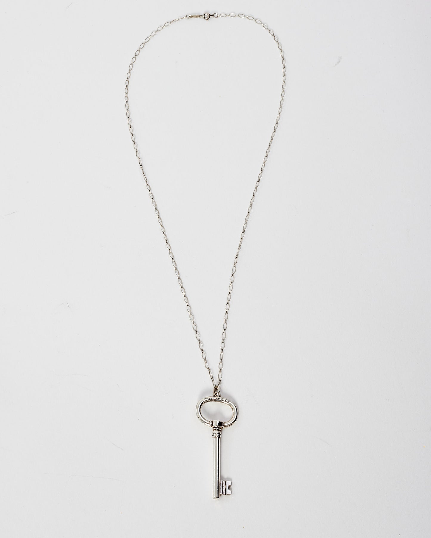 Tiffany 
Co. Silver Oval Key Pendant Necklace