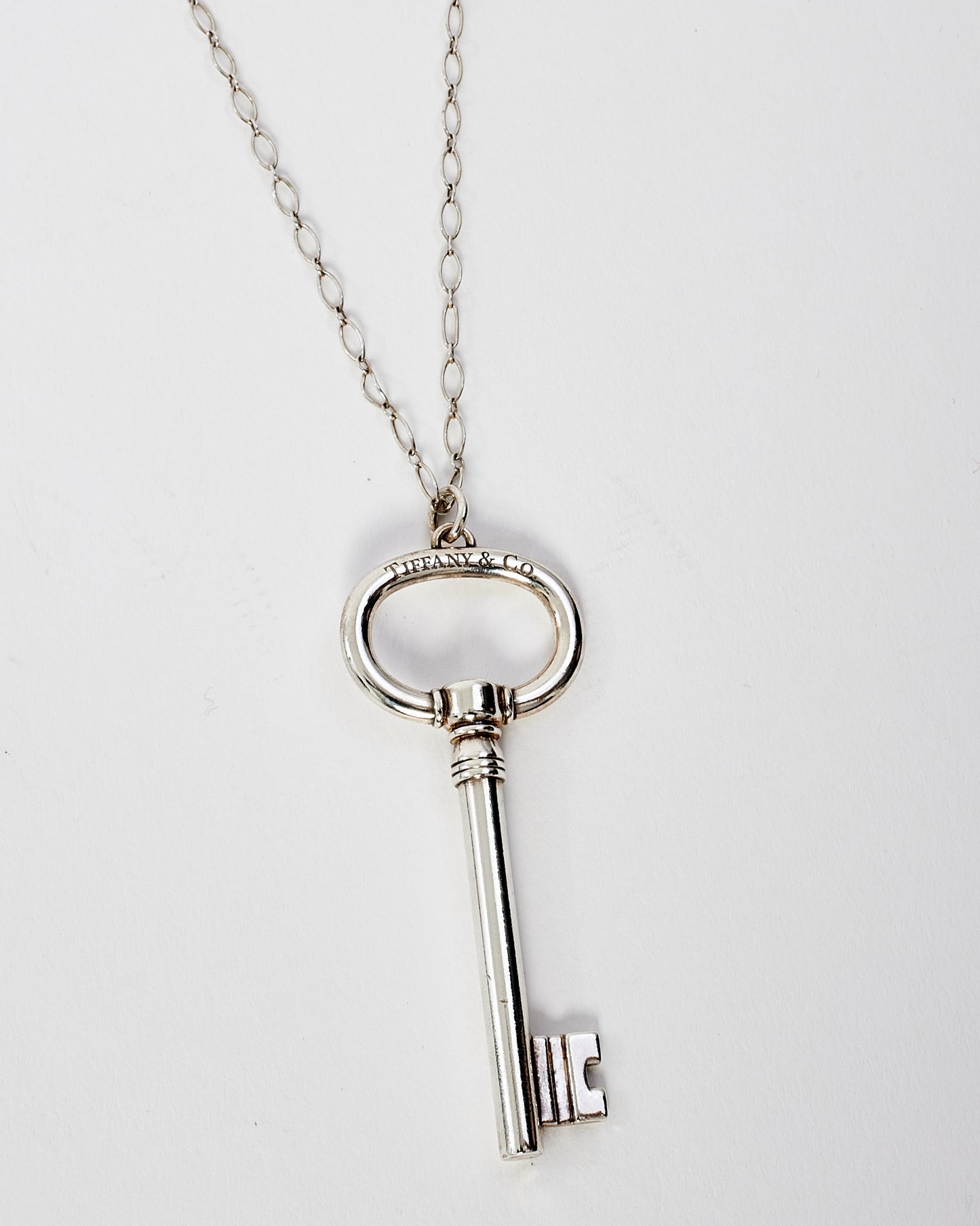 Tiffany 
Co. Silver Oval Key Pendant Necklace