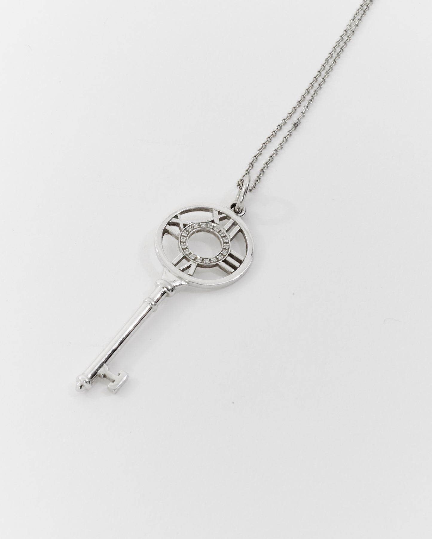 Tiffany 
Co. Diamond Atlas 18k White Gold Key Pendant Necklace