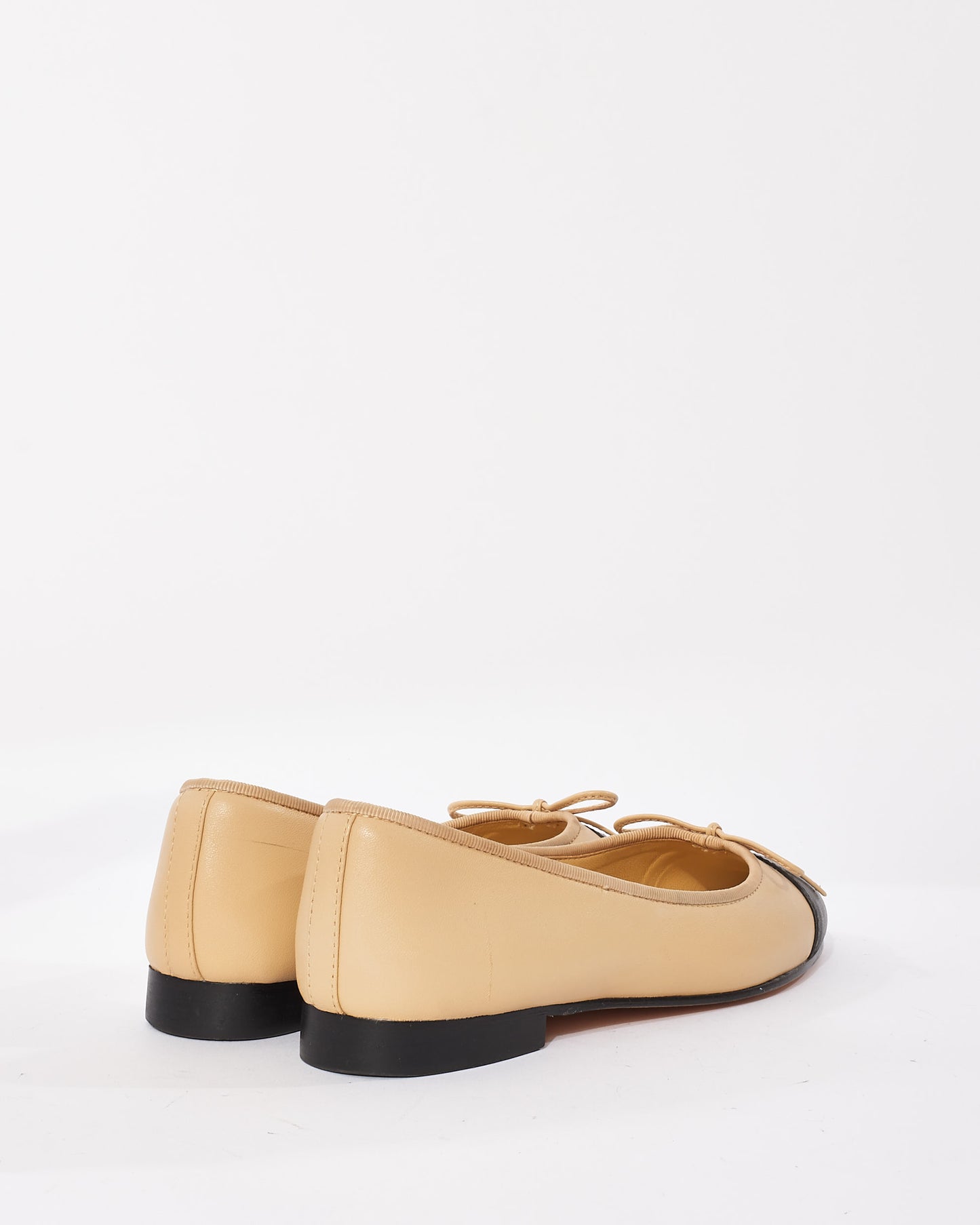 Chanel Beige 
Black Classic Logo Ballerina Flats - 38C