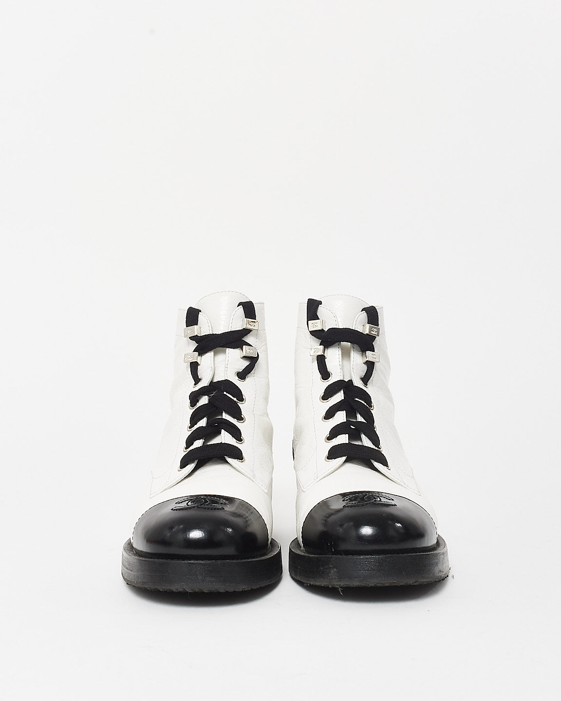 Chanel White Leather 
Black Cap Toe Combat Boots - 37.5