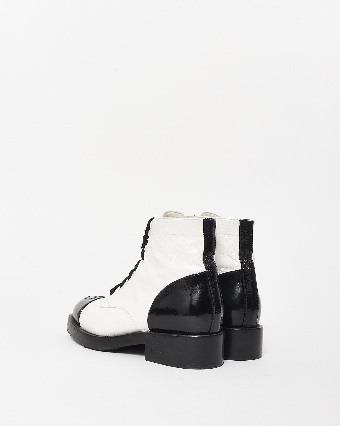 Chanel White Leather 
Black Cap Toe Combat Boots - 37.5