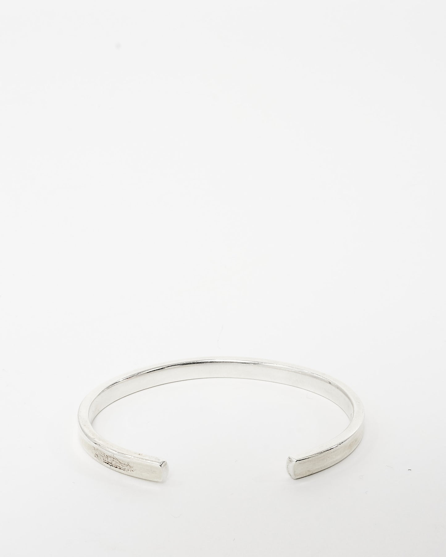 Tiffany 
Co. Silver T 
Co. Bangle Bracelet