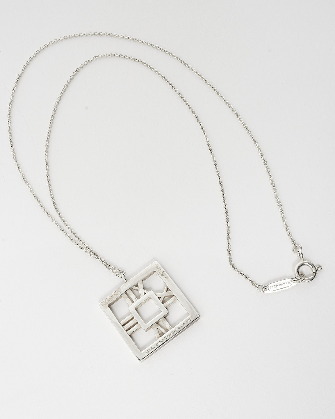 Tiffany 
Co. Silver Atlas Roman Number Pendant Necklace