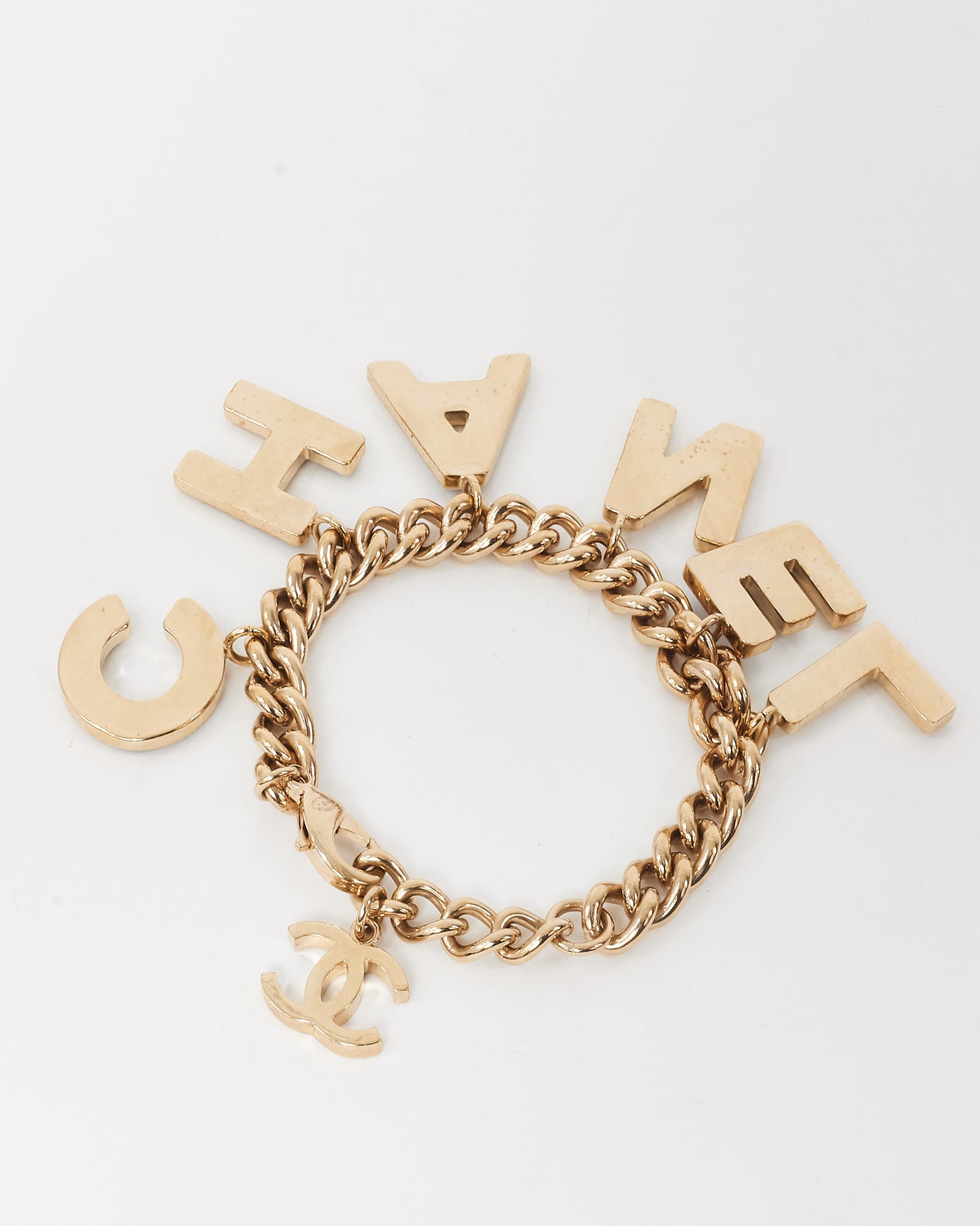 Chanel Gold-Tone Black and White Enamel CC Logo Charm Bracelet