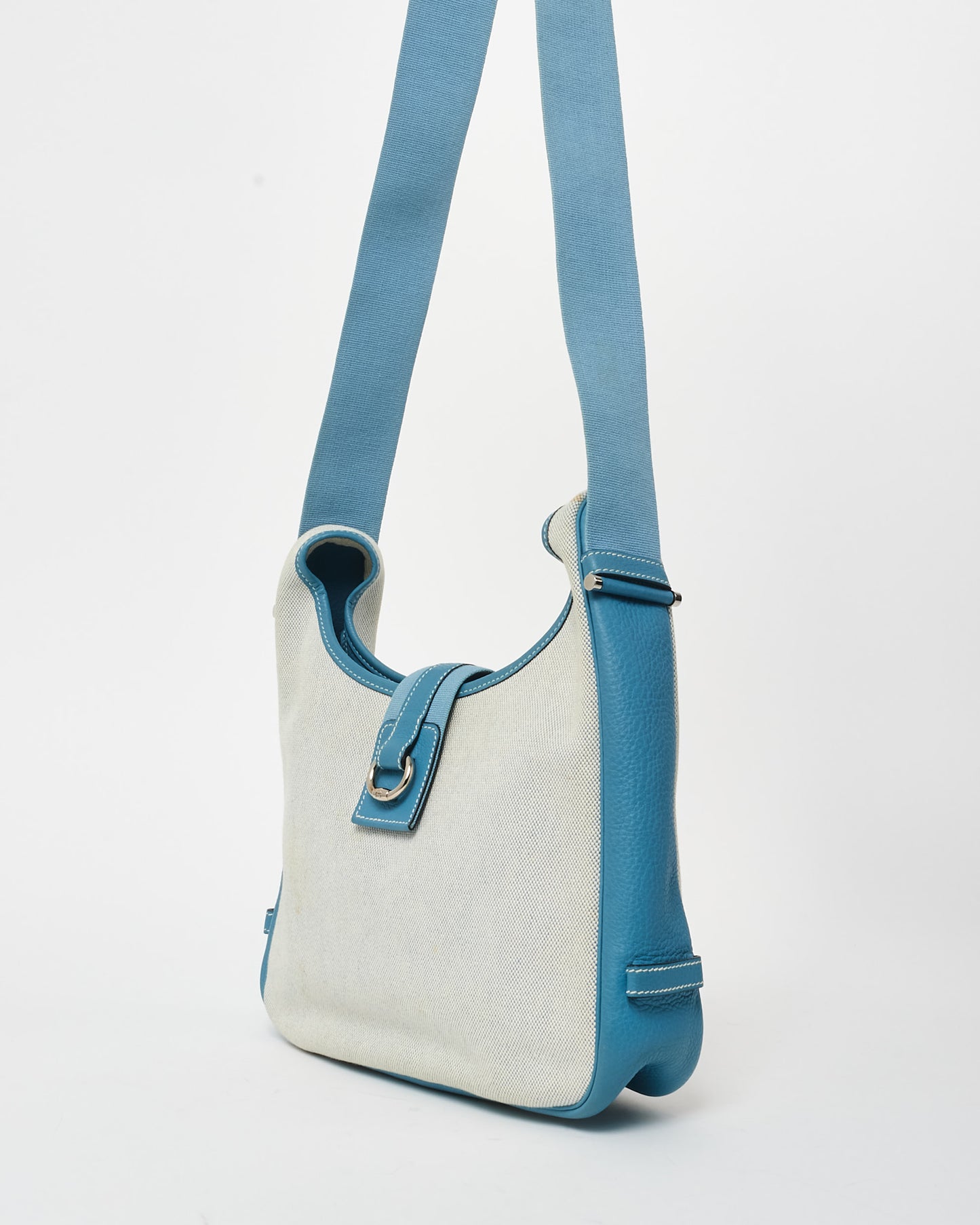 Hermès Vintage Blue Leather 
Beige Canvas Tsako bag