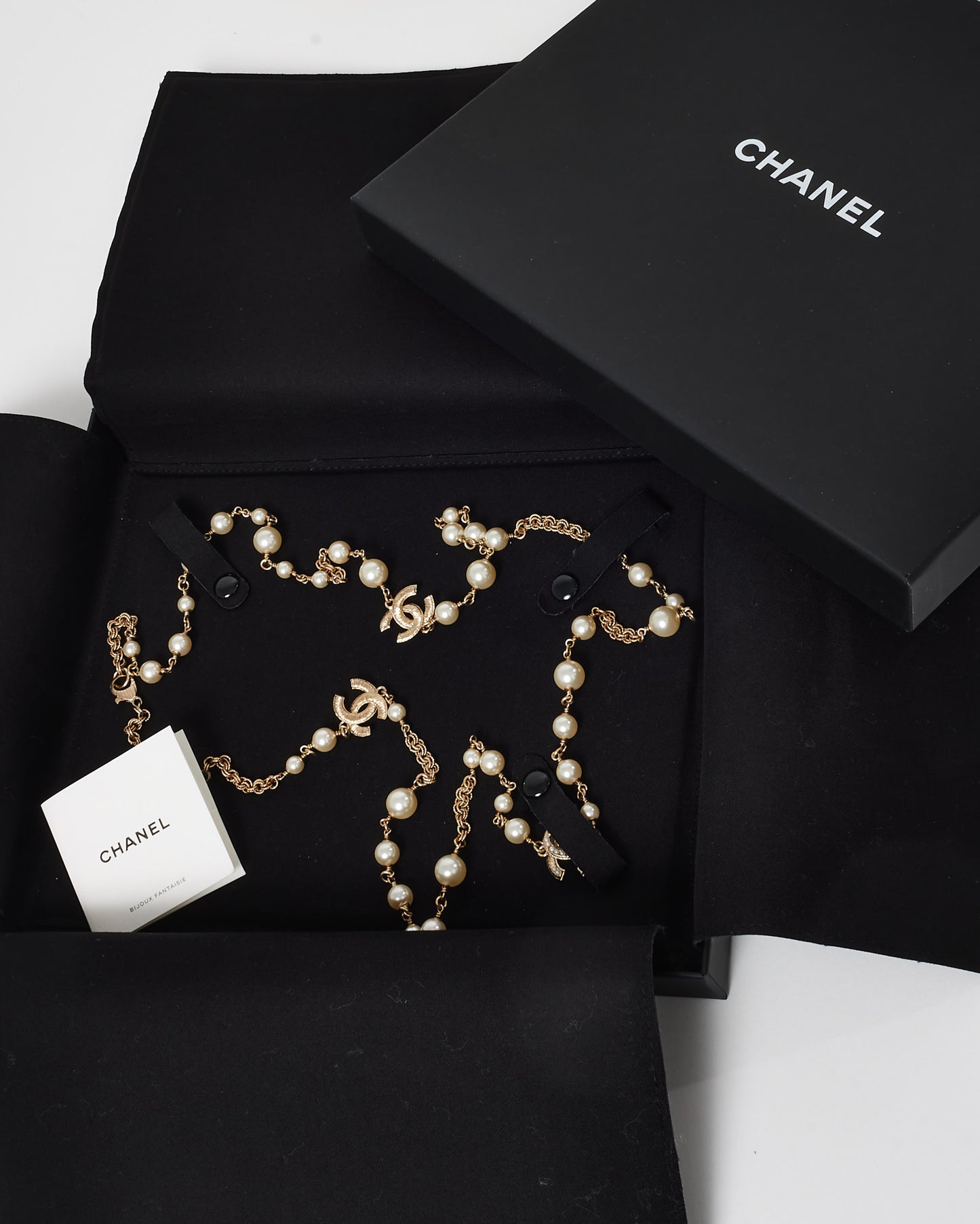 Chanel Pearl 
Gold CC Logo Long Necklace