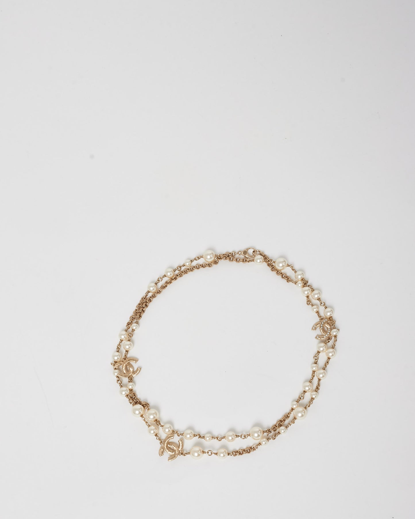 Chanel Pearl 
Gold CC Logo Long Necklace