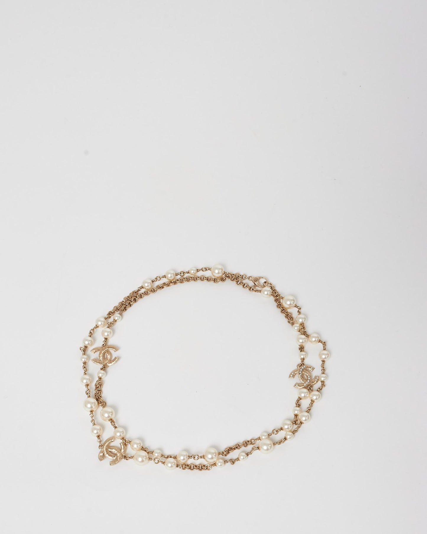 Chanel Pearl 
Gold CC Logo Long Necklace