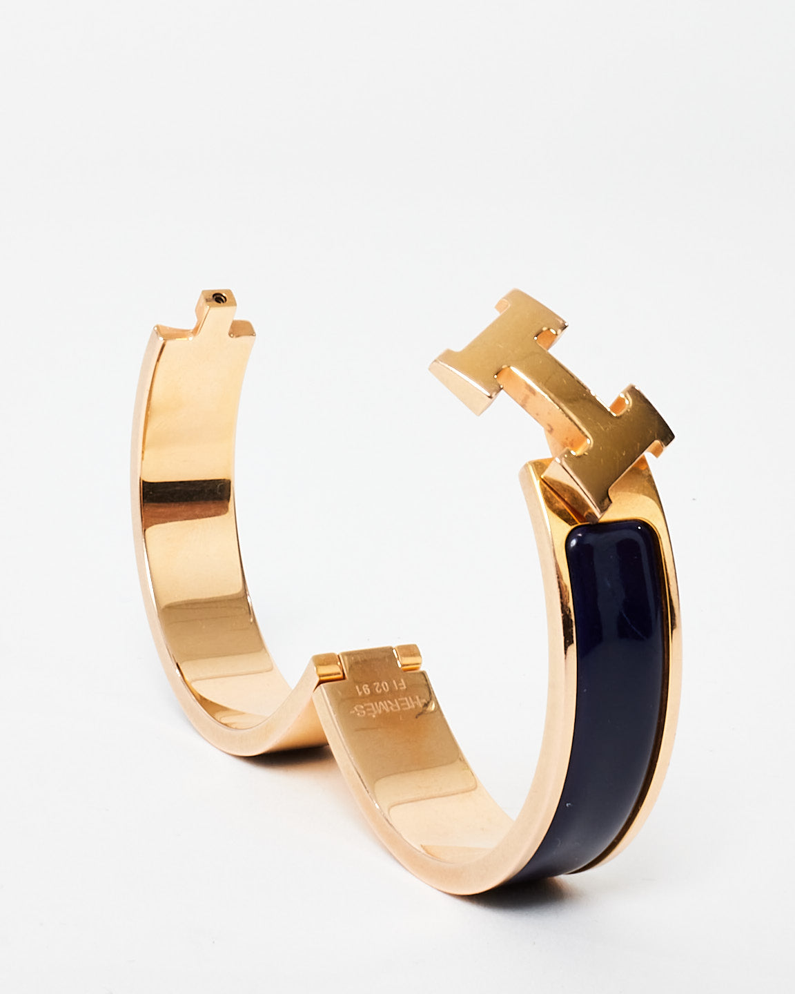 Hermès Navy Blue (Bleu Abysse) 
Rose Gold Clic Clac Bracelet - PM