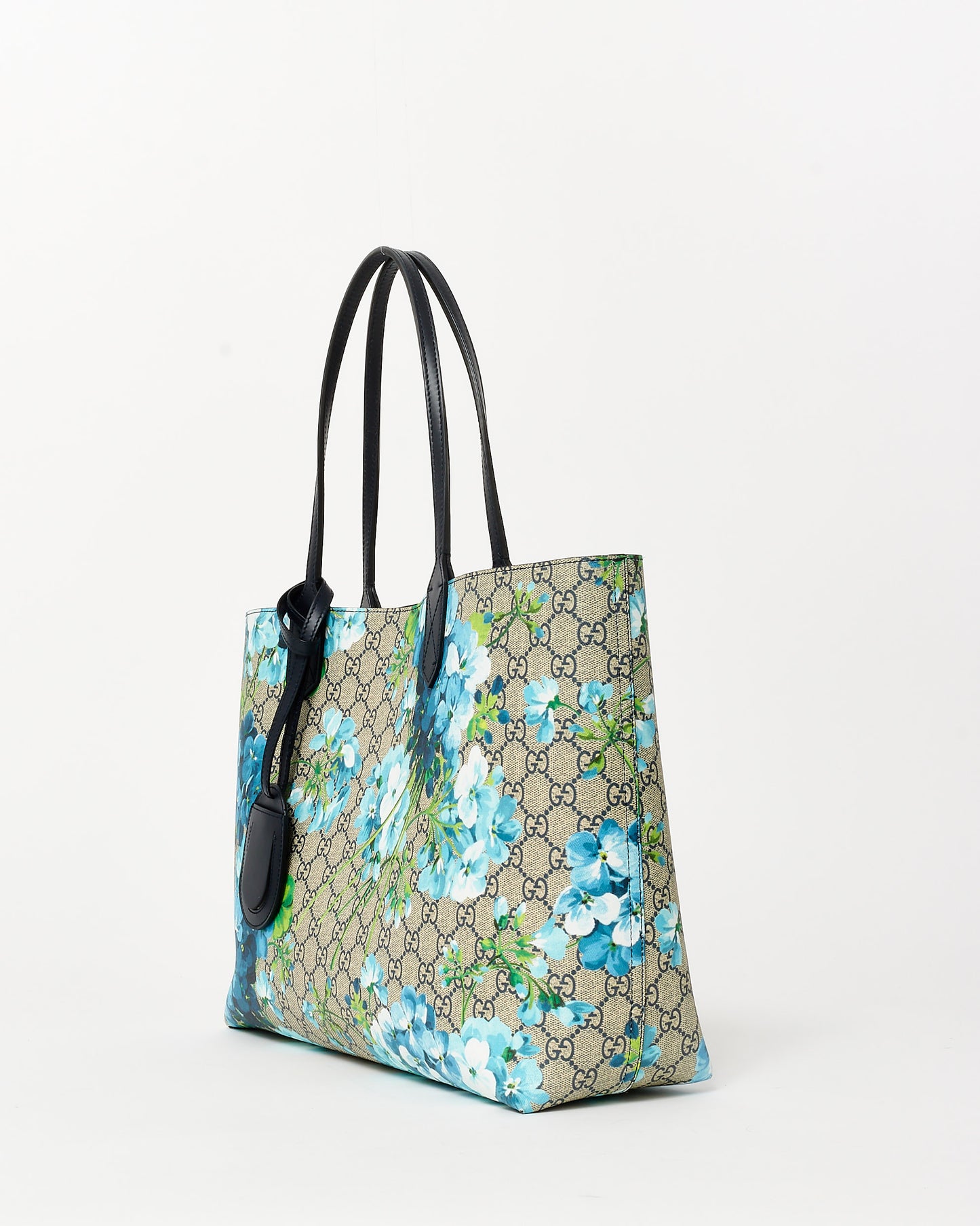 Gucci Monogram Coated Canvas 
Blue Flower Reversible Tote Bag