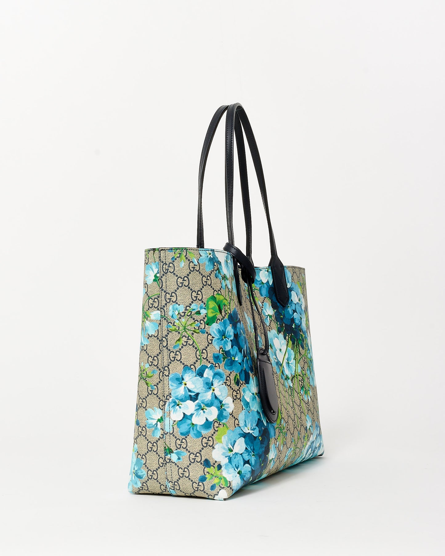 Gucci Monogram Coated Canvas 
Blue Flower Reversible Tote Bag