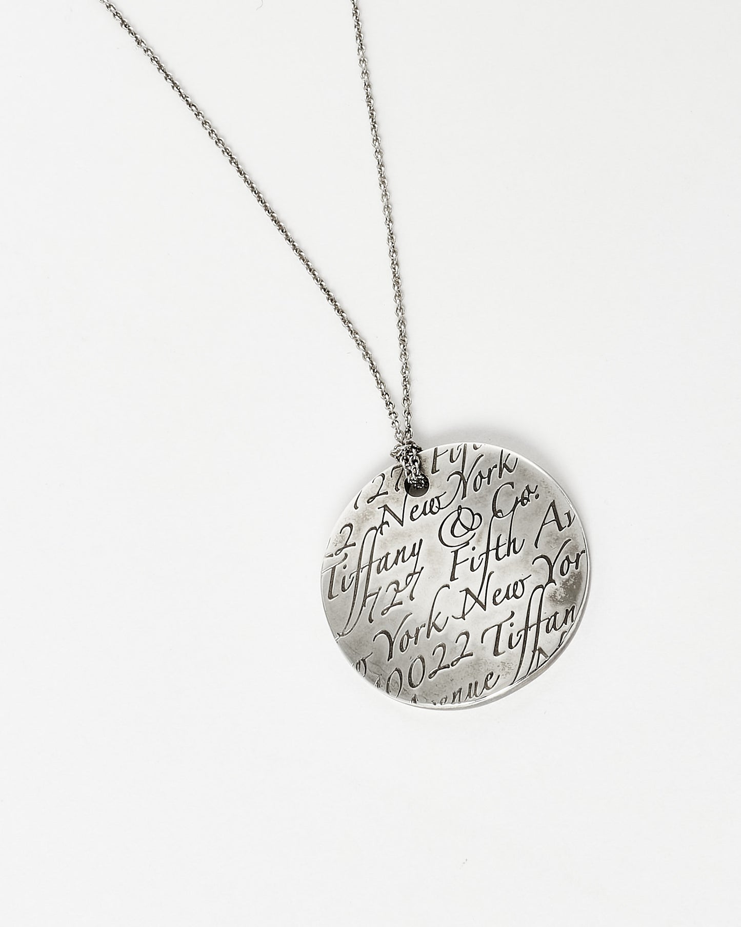 Tiffany 
Co. Silver Notes 5TH Ave. New York Disc Pendant Necklace