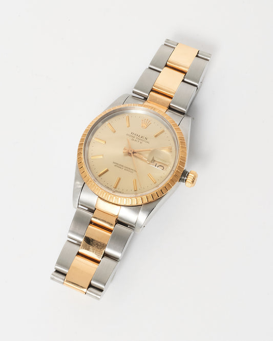 Rolex Vintage Oyster Perpetual 36 MM Dial Stainless Steel 
Yellow Gold Fluted Bezel Watch