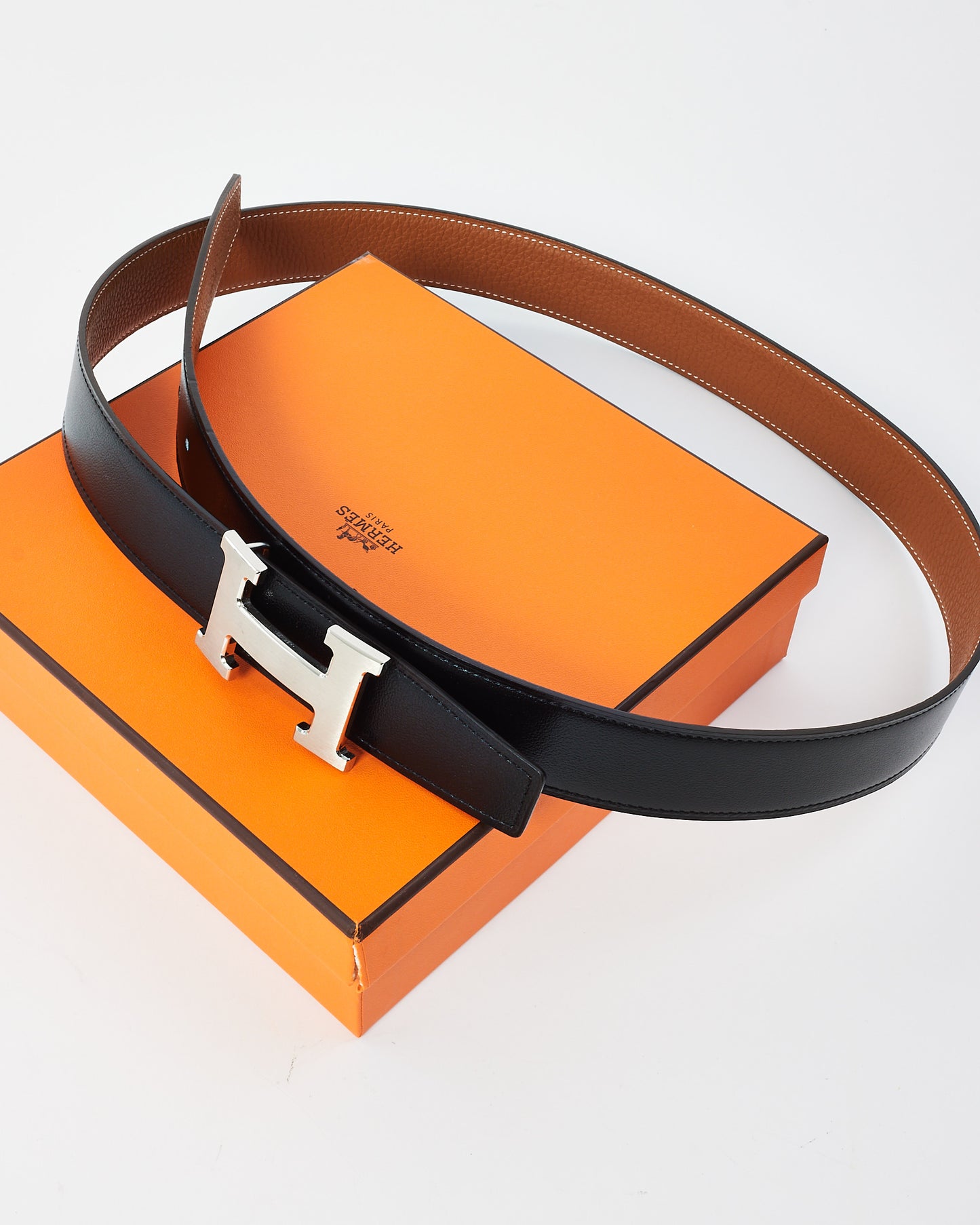 Hermes Gold/Black Clemence 
Swift Leather Reversible Palladium H Logo Belt - 100