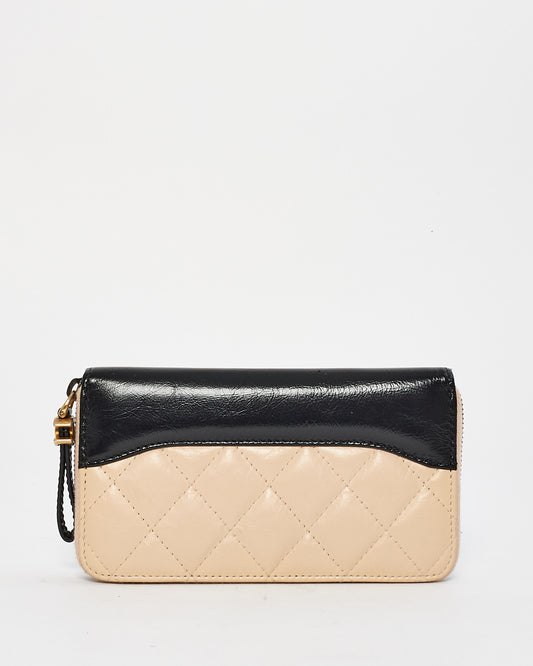 Chanel Beige 
Black Lambskin Leather Quilted Zip Wallet