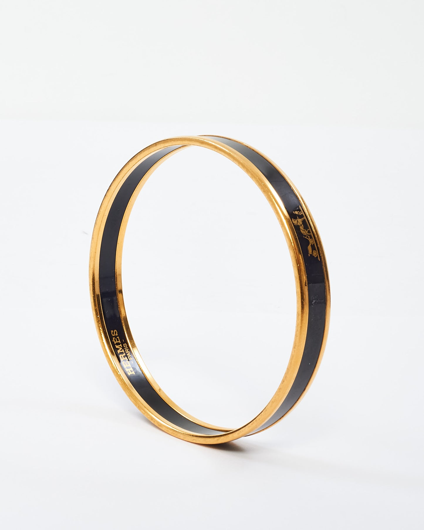 Hermès Black 
Gold Caleche Narrow Bangle