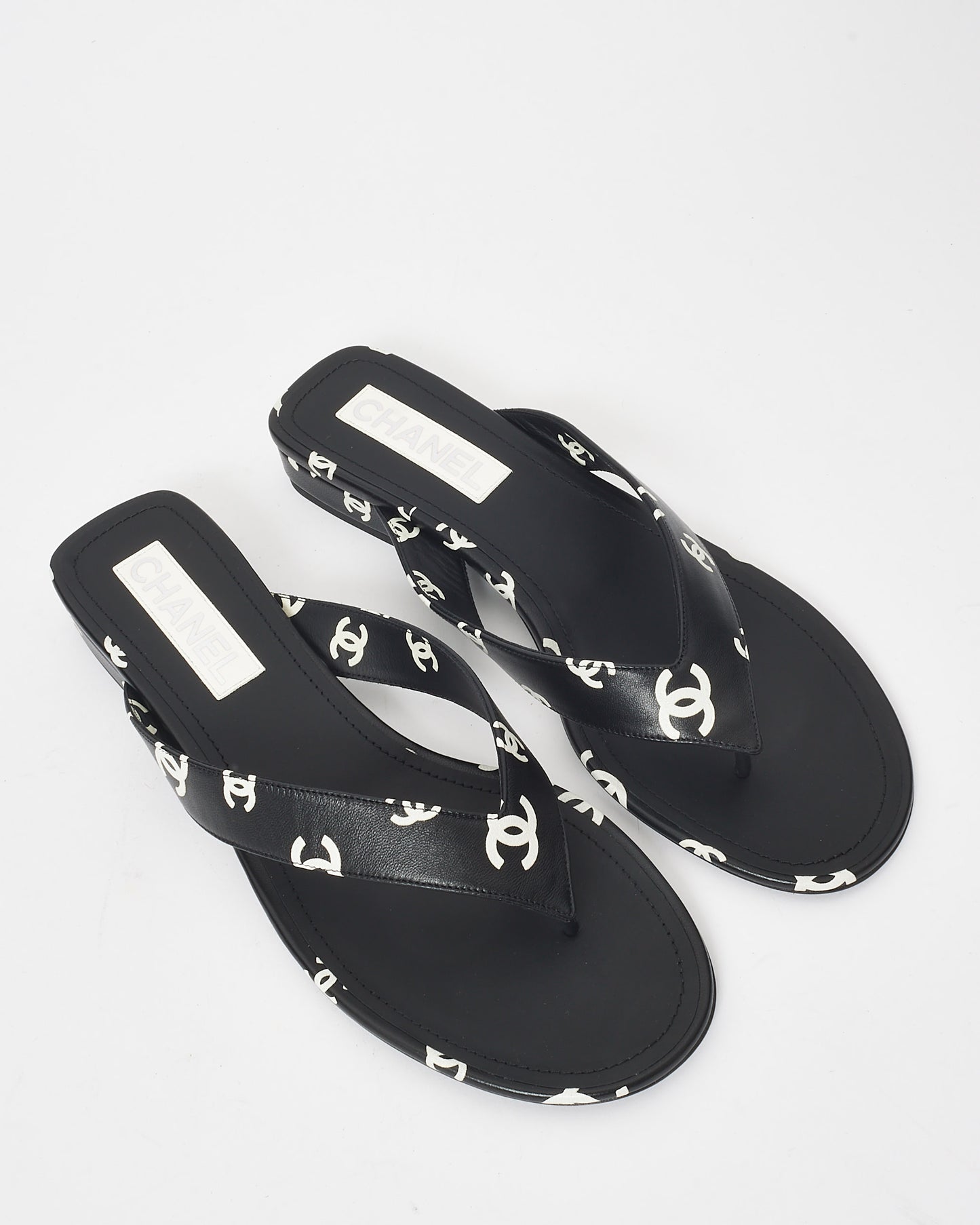 Chanel Black 
White Logo Leather 22S Flip Flop Sandals - 42