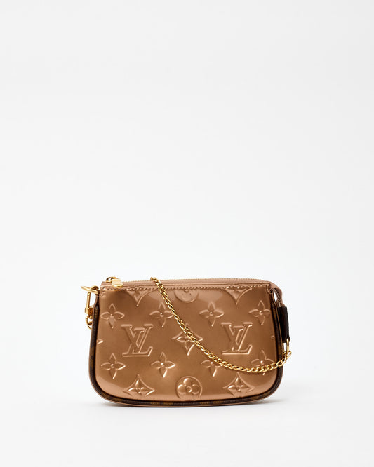 Louis Vuitton Rose Gold Vernis Mini Pochette D
Accessoires