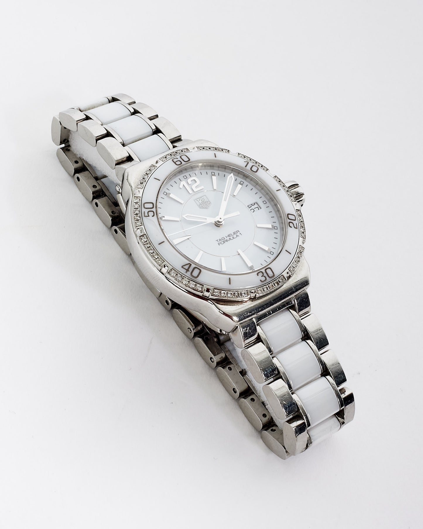 Tag Heuer Silver and White Ceramic 
Sterling Silver with Diamonds Formula 1 Ladies Watch