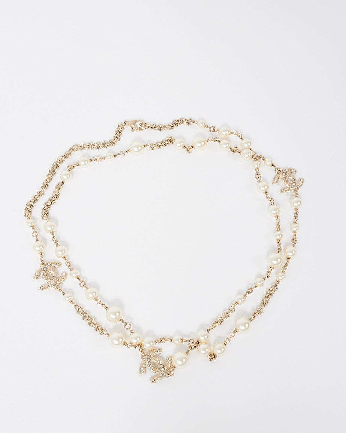 Chanel Pearl 
Gold CC Interlocking Long Station Necklace