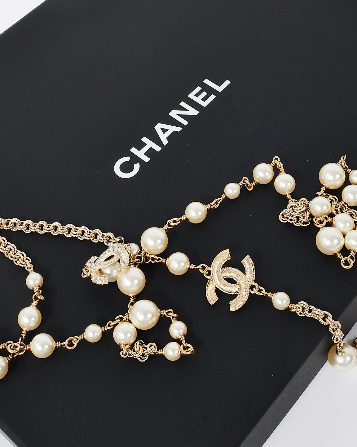 Chanel Pearl 
Gold CC Interlocking Long Station Necklace