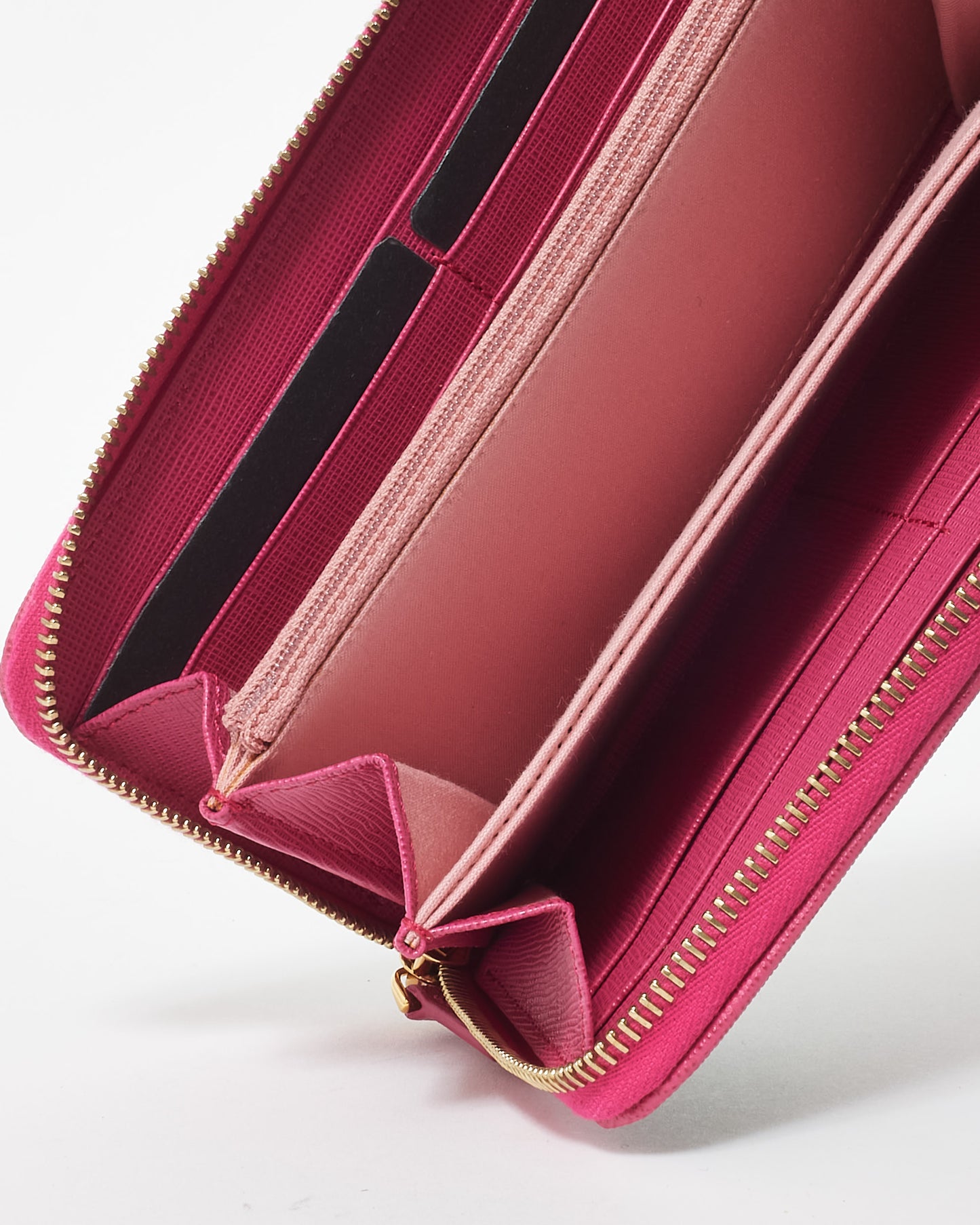 Fendi Zucca Coated Canvas 
Fuschia Long Zip Wallet