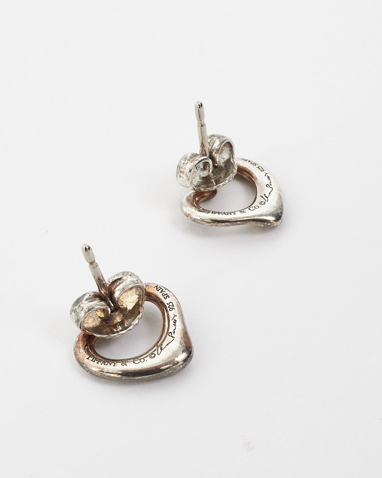 Tiffany 
Co. Elsa Peretti Open Heart Stud Earrings