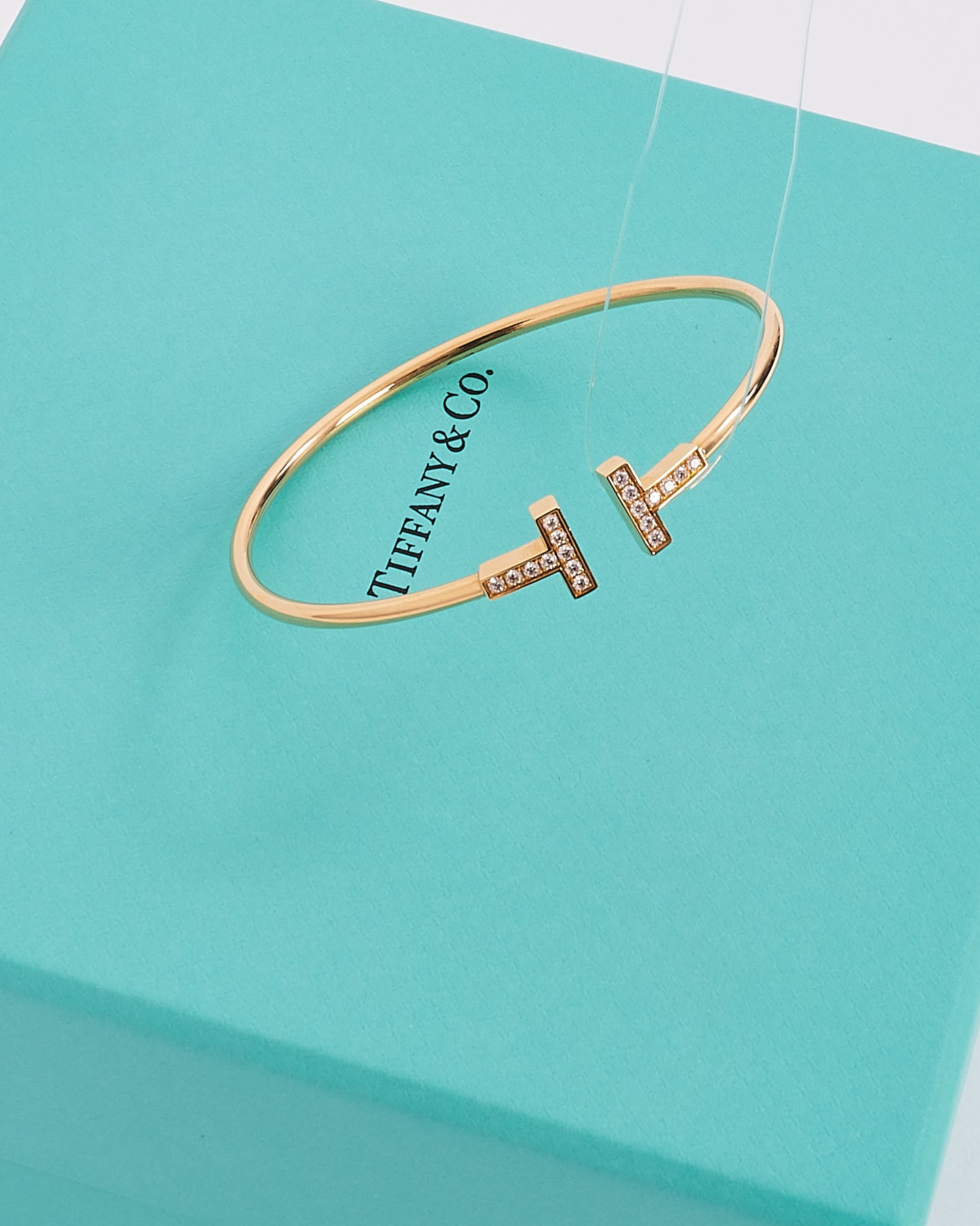 Tiffany 
Co. Gold with Diamonds Tiffany T Wire Bracelet