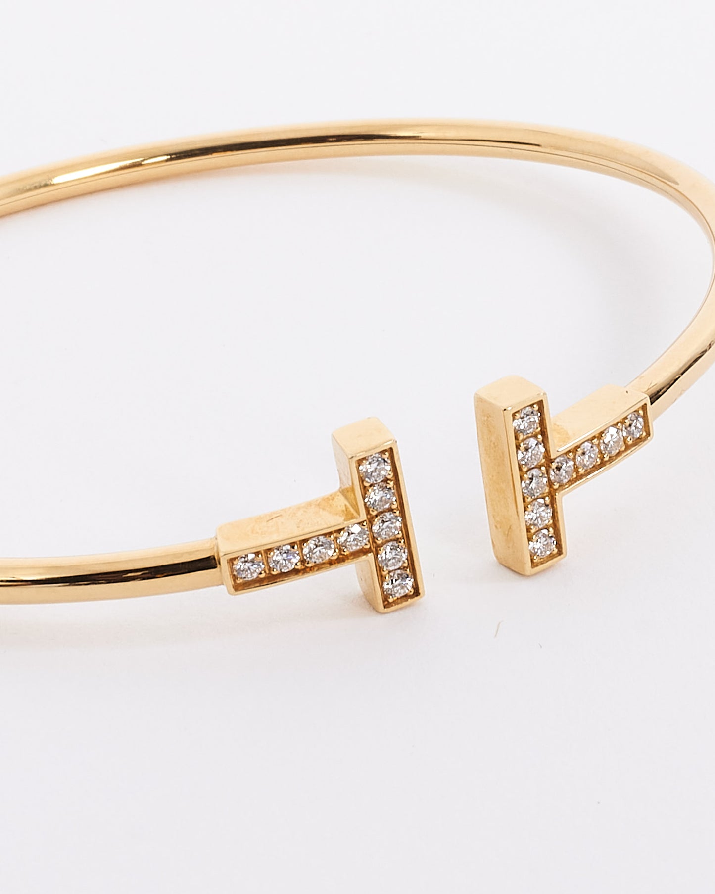 Tiffany 
Co. Gold with Diamonds Tiffany T Wire Bracelet