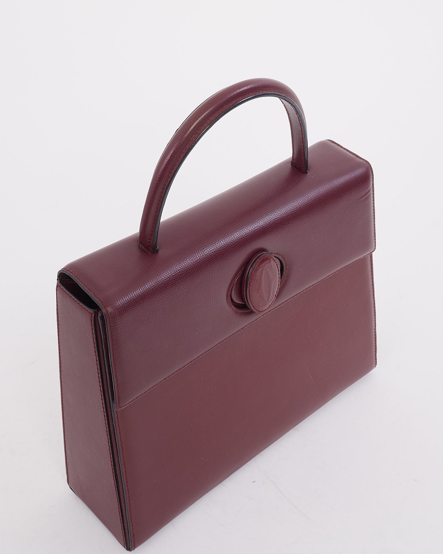 Sac à poignée supérieure Signature en cuir bordeaux Cartier