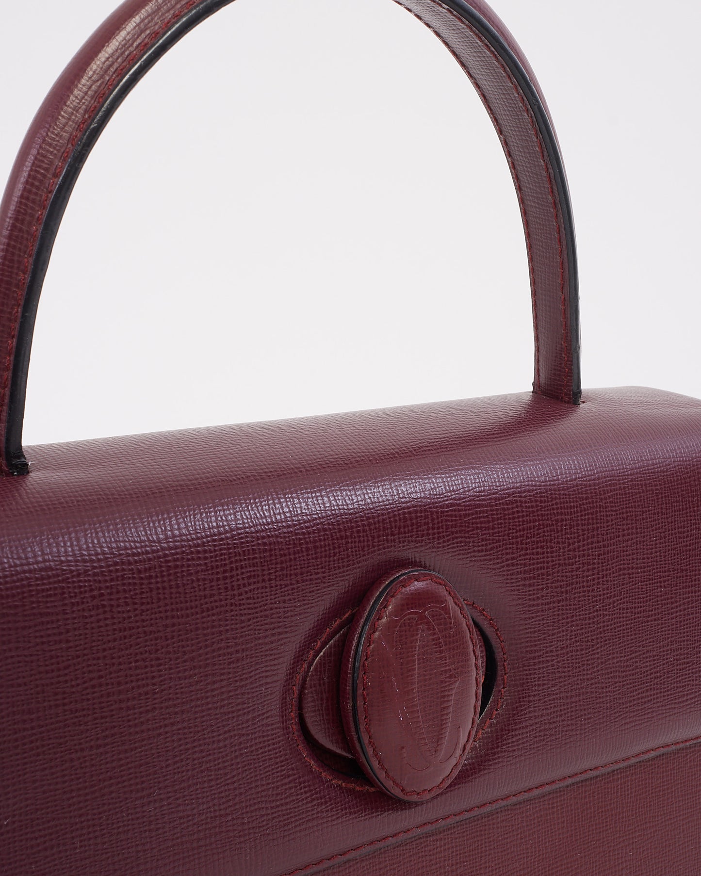 Sac à poignée supérieure Signature en cuir bordeaux Cartier