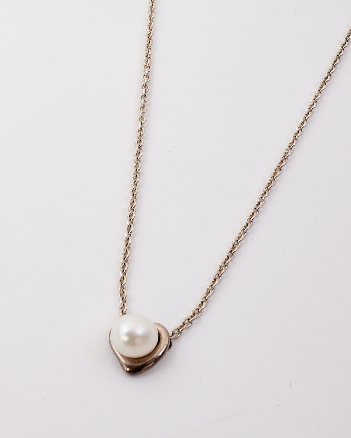 Tiffany 
Co. Silver 
Pearl Open Heart Lariat Elsa Peretti Necklace