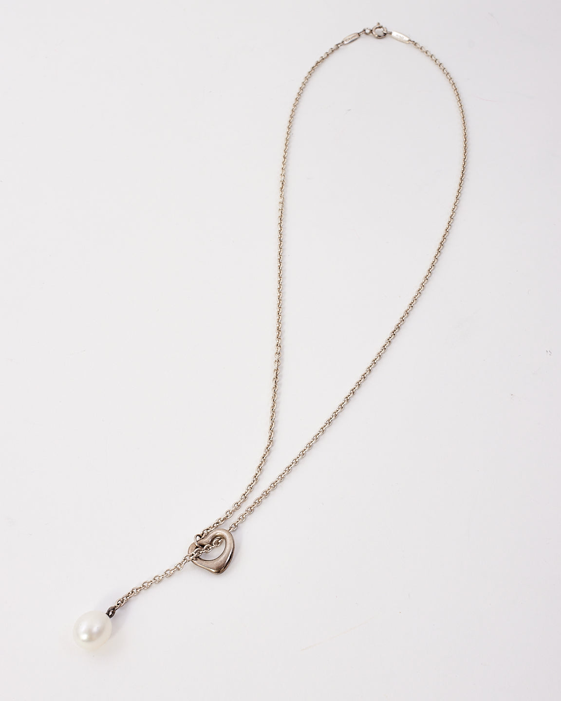 Tiffany 
Co. Silver 
Pearl Open Heart Lariat Elsa Peretti Necklace