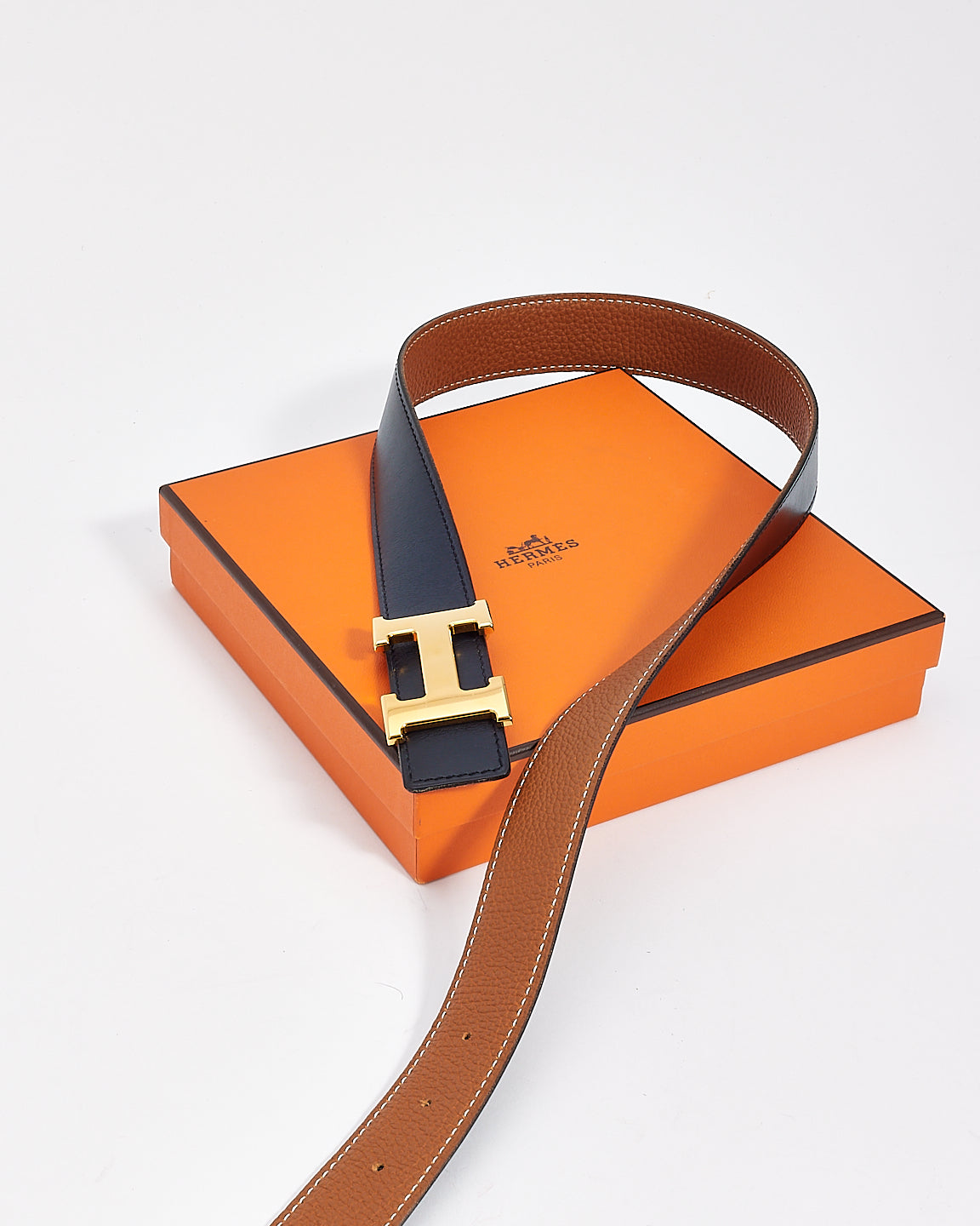 Hermès Gold/Navy Clemence 
Swift Leather Reversible Brushed Gold H Logo Belt - 90