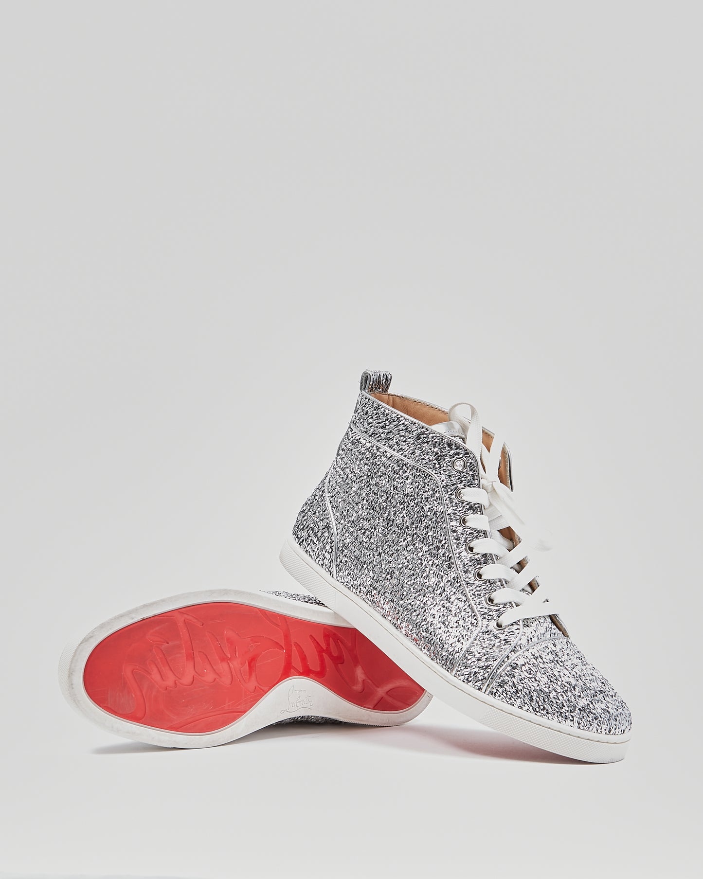 Christian Louboutin Baskets montantes en feuille d
argent - 40,5