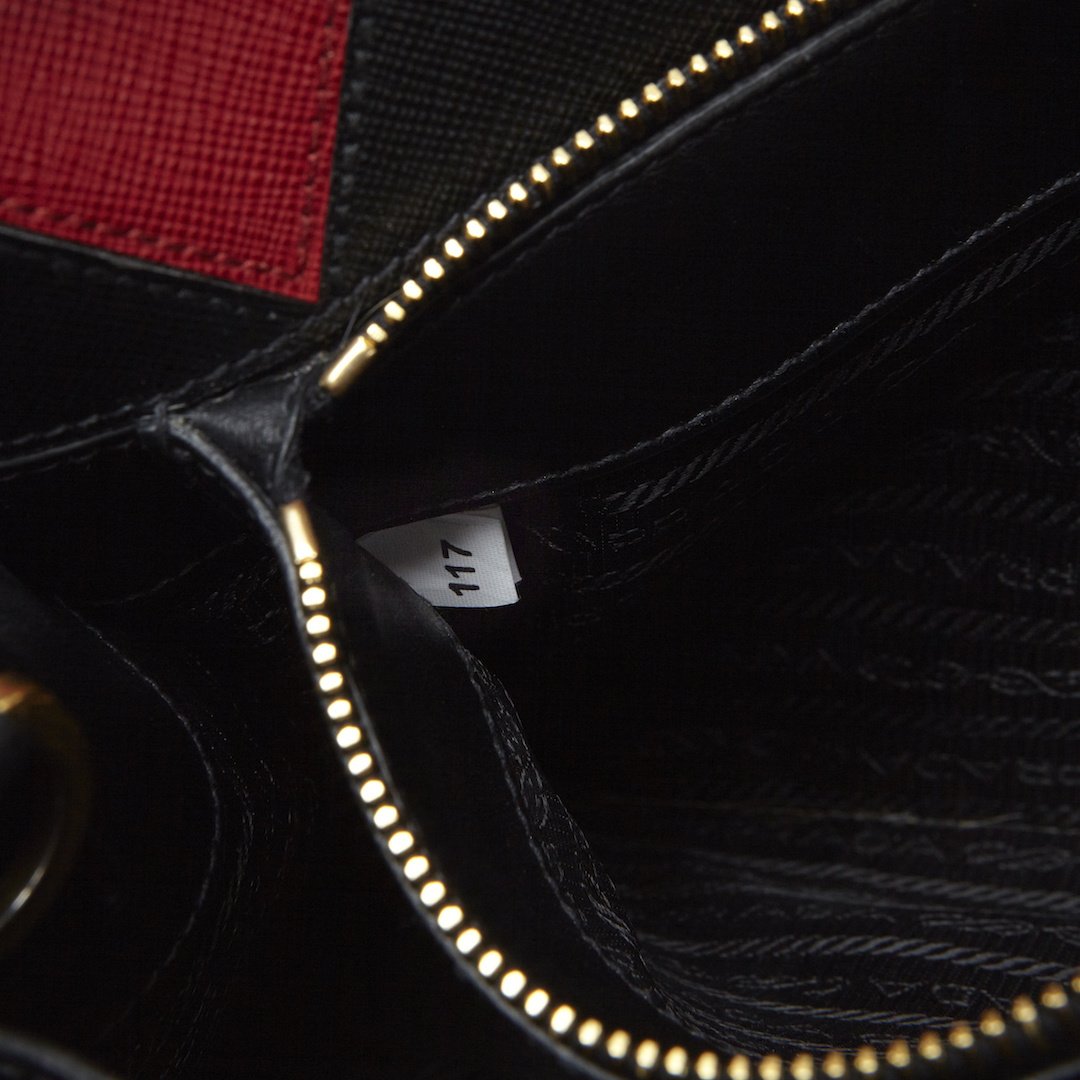 Prada Black 
Red Saffiano Geometric-Strap Tote